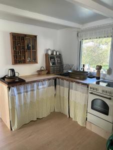 Appartements Chalet sur terrain arbore : photos des chambres