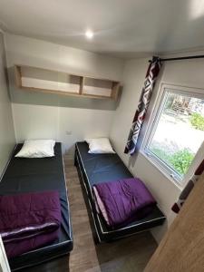 Campings Mobil home 2 chambres tout confort : photos des chambres