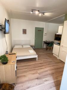 Appartements Escapade Ardechoise - Parking Gratuit - Chateau a 2 pas : photos des chambres