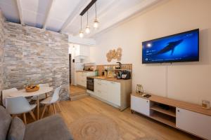 Appartements La ferme Saint-Antoine : photos des chambres