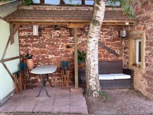 Appartements Le Grenier - Piscine et SPA : photos des chambres