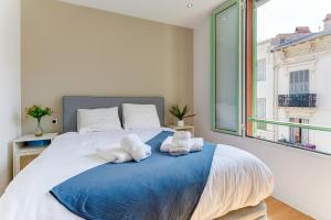 Appartements 33 MARINONI AP4438 by Riviera Holiday Homes : photos des chambres