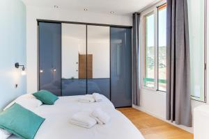 Appartements 33 MARINONI AP4438 by Riviera Holiday Homes : photos des chambres