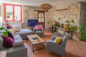 Maisons de vacances Gite Lunaben-Maison en pierres avec piscine : photos des chambres