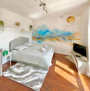 Appartements Charmant studio a 4 stations de Paris : photos des chambres