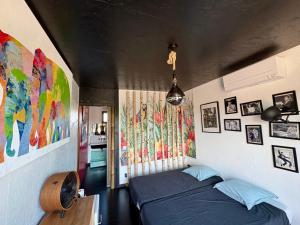 Sejours chez l'habitant Une adorable chambre SUR les toits : photos des chambres