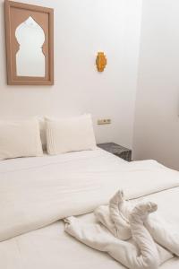 Refuge blanc terrasse priveee a cite de Majorelle