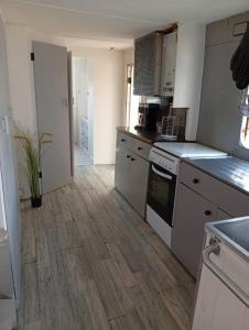 Campings Mobil-Home avec piscine et jardin 1500 m2 : photos des chambres