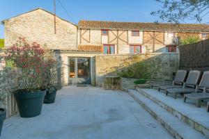 Maisons de vacances Gite Lunaben-Maison en pierres avec piscine : photos des chambres