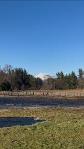Cabaña con vista al volcán