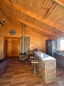 Cabaña con vista al volcán