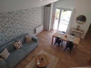 Appartements Au son de l-eau : photos des chambres