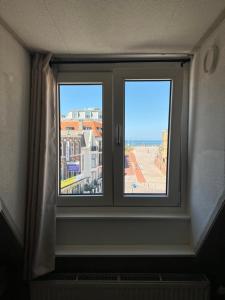 Beachfront studio with sunset view