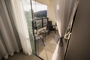 Flat moderno com ar condicionado Edifício novo com área de Lazer completa e a poucos passos do calçadão Faça tudo a pé