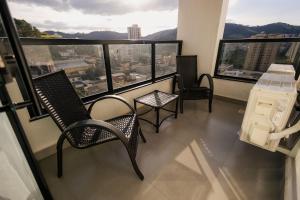 Flat moderno com ar condicionado Edifício novo com área de Lazer completa e a poucos passos do calçadão Faça tudo a pé