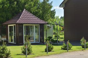 Baltijos Vėjo Apartment with patio and grill