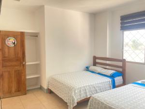 Liza, habitación privada de Flor de Lis Beach House