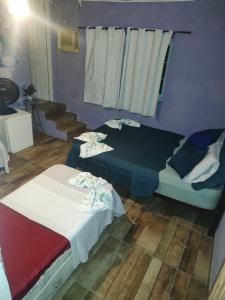 Pousada Dádiva Encanto da Orquídea a passos da praia do Pontal c ar e frigobar