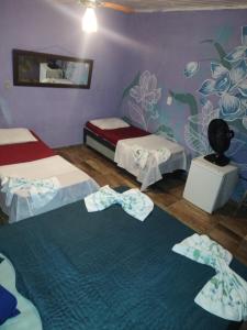 Pousada Dádiva Encanto da Orquídea a passos da praia do Pontal c ar e frigobar