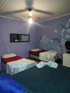 Pousada Dádiva Encanto da Orquídea a passos da praia do Pontal c ar e frigobar