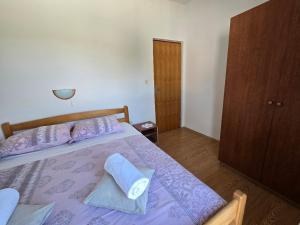 Apartments with parking space Palit, Rab - 24756