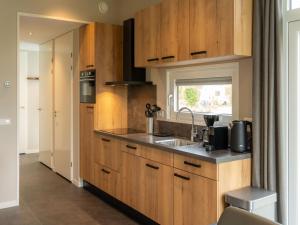 Holiday home in Sint Nicolaasga by the water