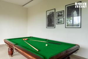 StayVista at Gardenéa with Outdoor Pool, Huge Lawn