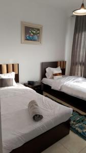 شقة دوبلكس مستوي فندقي بورتو كايرو التجمع الخامس عائليه704