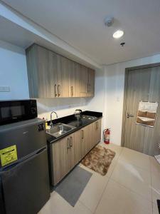 Cozy 2 Beds Near Mall of Asia