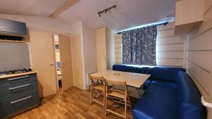 Campings Mobil-home V 3 chambres, climatise, cuisine equipee, TV & Wi-Fi : photos des chambres