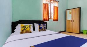 SPOT ON 91159 Kost Putrana Syariah