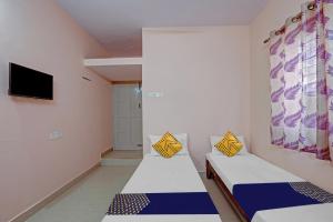 SPOT ON New Mysore Stays