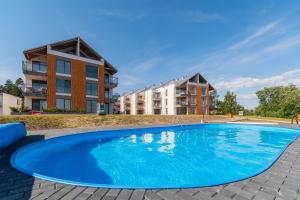 Flatbook Apartament Miami Beach - basen, taras i stylowe wnętrza w Krynicy Morskiej