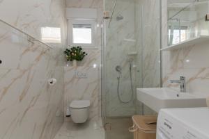 Adriatic Split beach apartment with sea view and garden