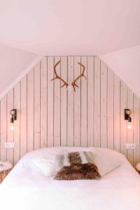 Chambre avec jacuzzi ou Chalets dans les bois