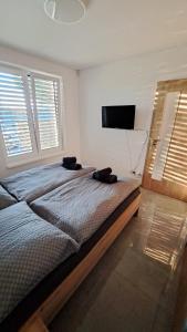 Moderný 3 izbový dom so záhradou a terasou blízko Bratislavy