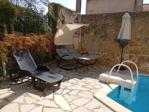 Maisons de vacances La Maison des Vendangeurs a Puisserguier : Maison de Vacances