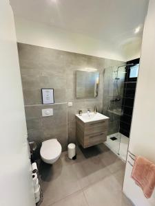 Appartements N4 Maison T2 climatise : photos des chambres