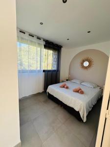 Appartements N4 Maison T2 climatise : photos des chambres