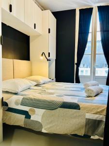 Appartements Studio Malheux centre ville avec terrasse : photos des chambres