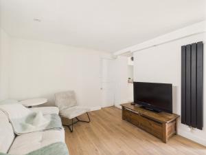 Maisons de vacances Maison pour 6 avec jardin proche du centre : photos des chambres