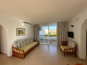 Two-Bedroom Apartment (4 Adults + 1 Child) room in Apartamentos Leo