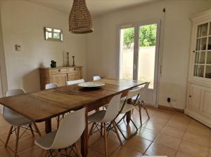 Villas Maison familiale avec jardin : photos des chambres