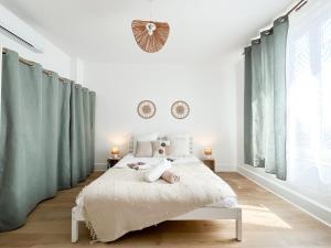 Appartements Le Charmant, 2 chambres, Parking : photos des chambres