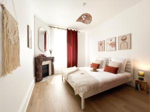 Appartements Le Charmant, 2 chambres, Parking : photos des chambres