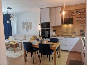 Apartament Pod Modrzewiem