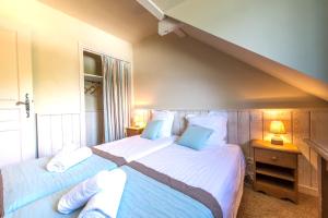Appartements La Baie des Voiles, FEET IN THE CRYSTAL WATERS, 9 Apts from studio to Duplex by LLA SELECTIONS : photos des chambres