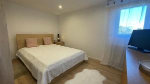 Appartements Le Havre d-Athena, App spacieux 2 chambres, Grand Jardin Prive, Sauna, WiFi & Abri Velos : photos des chambres