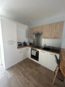 Appartements Appartement neuf plein centre : photos des chambres