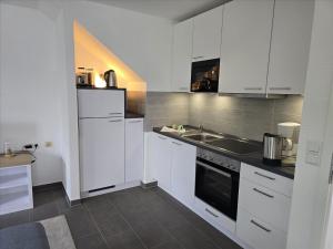 Feriendorf Rugana - Komfort Ferienwohnung mit 1 Schlafzimmer und Terrasse A55